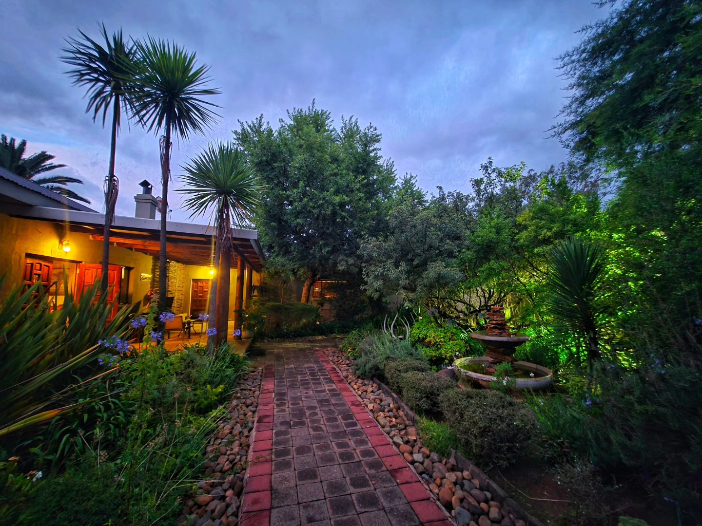 Aqua Terra Guesthouse exterior at golden hour
